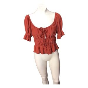 Women's Rust Peplum Top size Large